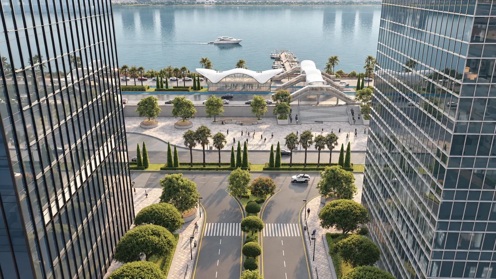 Landscaped streets and the riverfront pavilion between glazed commercial towers.